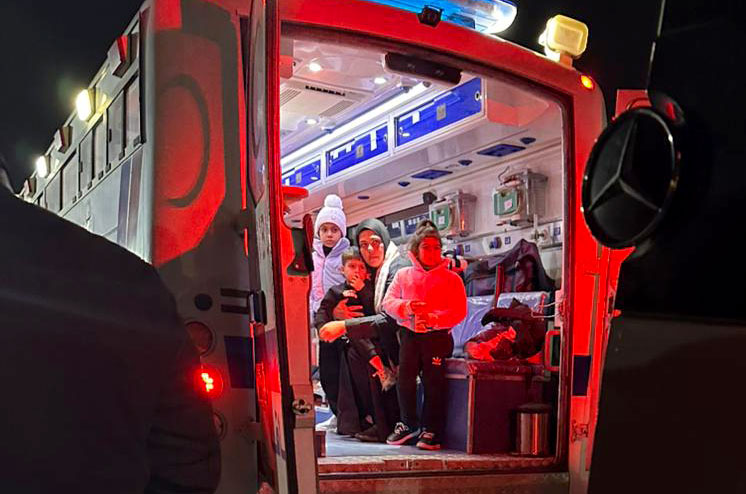 Ali with family in medical transit