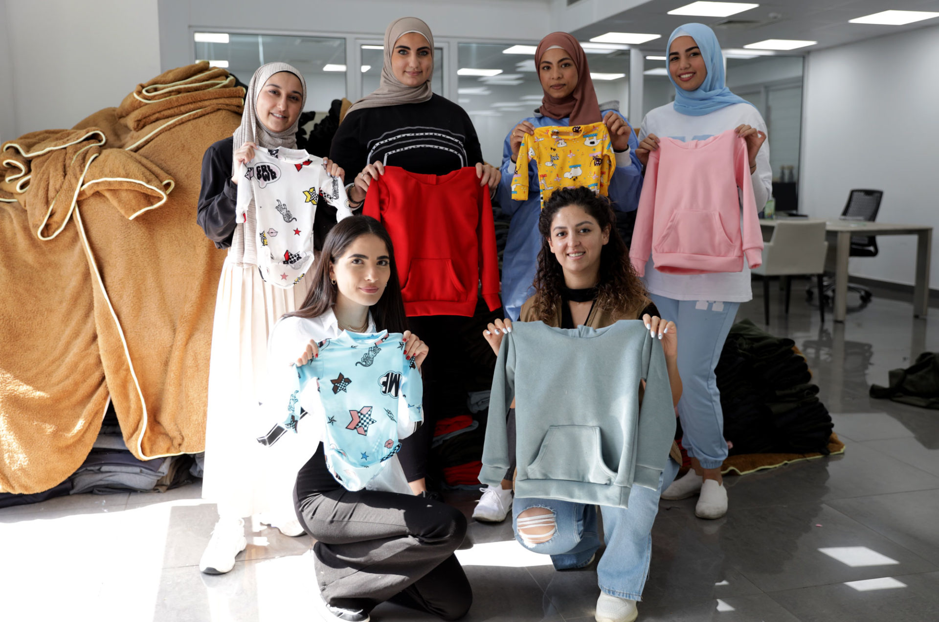 In 2022, 65 men and women, aged between 18 and 24, sewed winter kits for 7,400+ people.