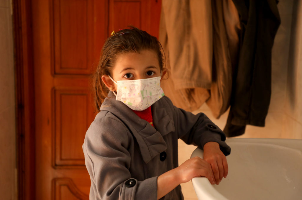 Young girl at her sink