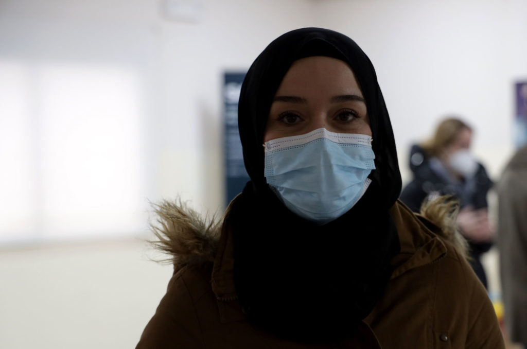 Samira Qadi in a face mask at a Sama Project activity