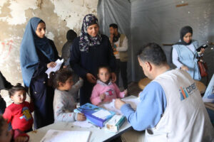 Checking in patients at Anera's Jabalia healthcare center.