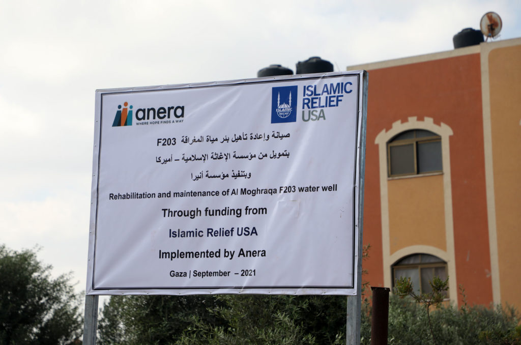 Project sign at the construction site of the water well in Mughraqa, Gaza.