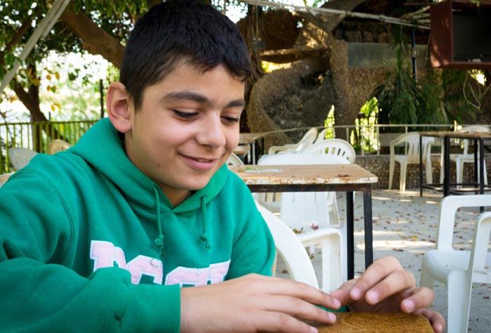 Jawad, refugee from Syrian conflict, is happy he joined Anera's sports program in Lebanon where he has made new friends.
