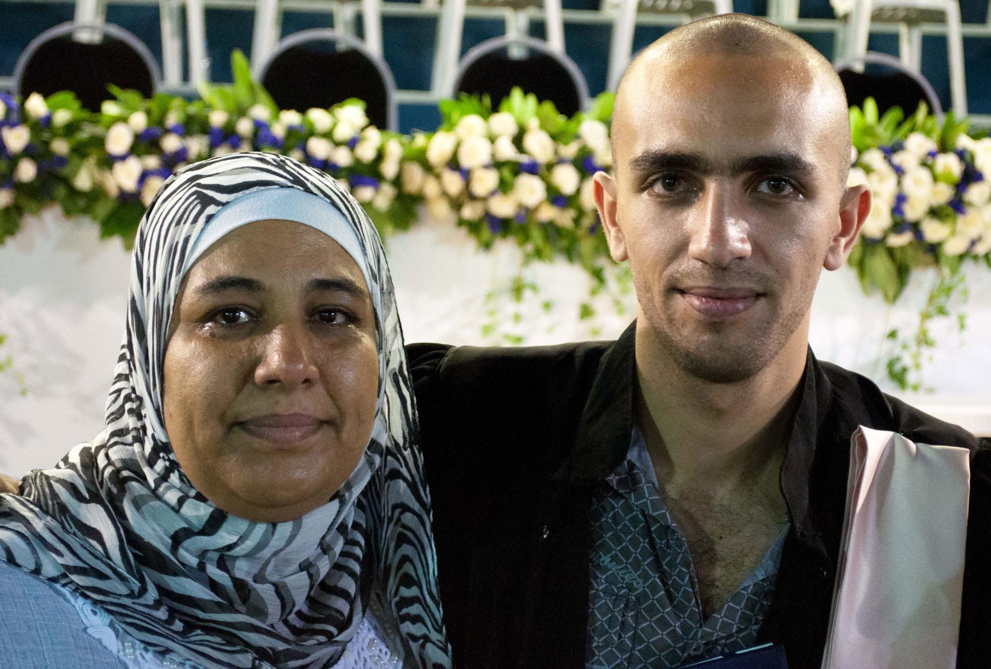 Mohammad with his mother at his graduation from technical school. Anera sponsored his studies.