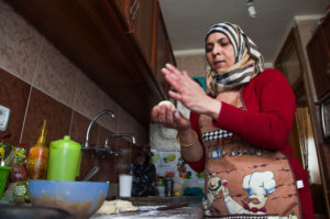 Majida, a refugee woman in Nahr El Bared, is starting a pastry-making business.