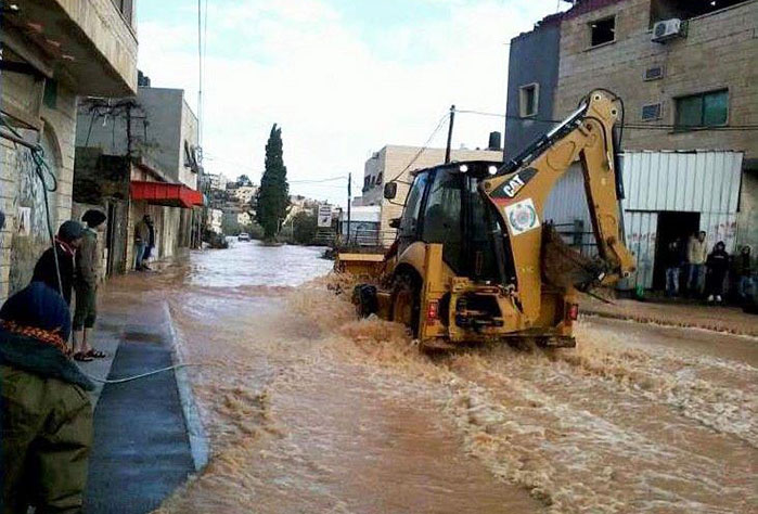 The flooding in Qabatia impacted everyday life, preventing children from reaching schools and patients from reaching clinics and hospitals.