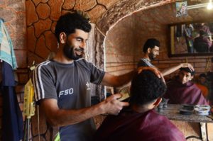 Abdel Kareem's barbershop in El Sawarha has come to life with the new water connection Anera provided.
