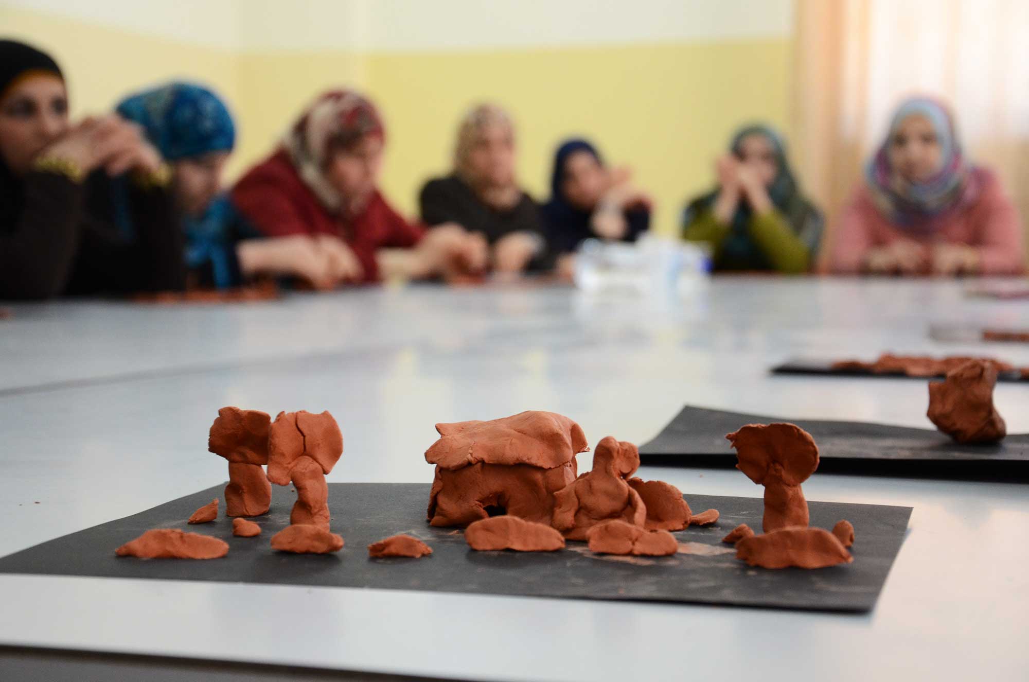 TOT-ARTS-5 Each teacher made a clay model of a place that is dear to their hearts, or one they dream of visiting.