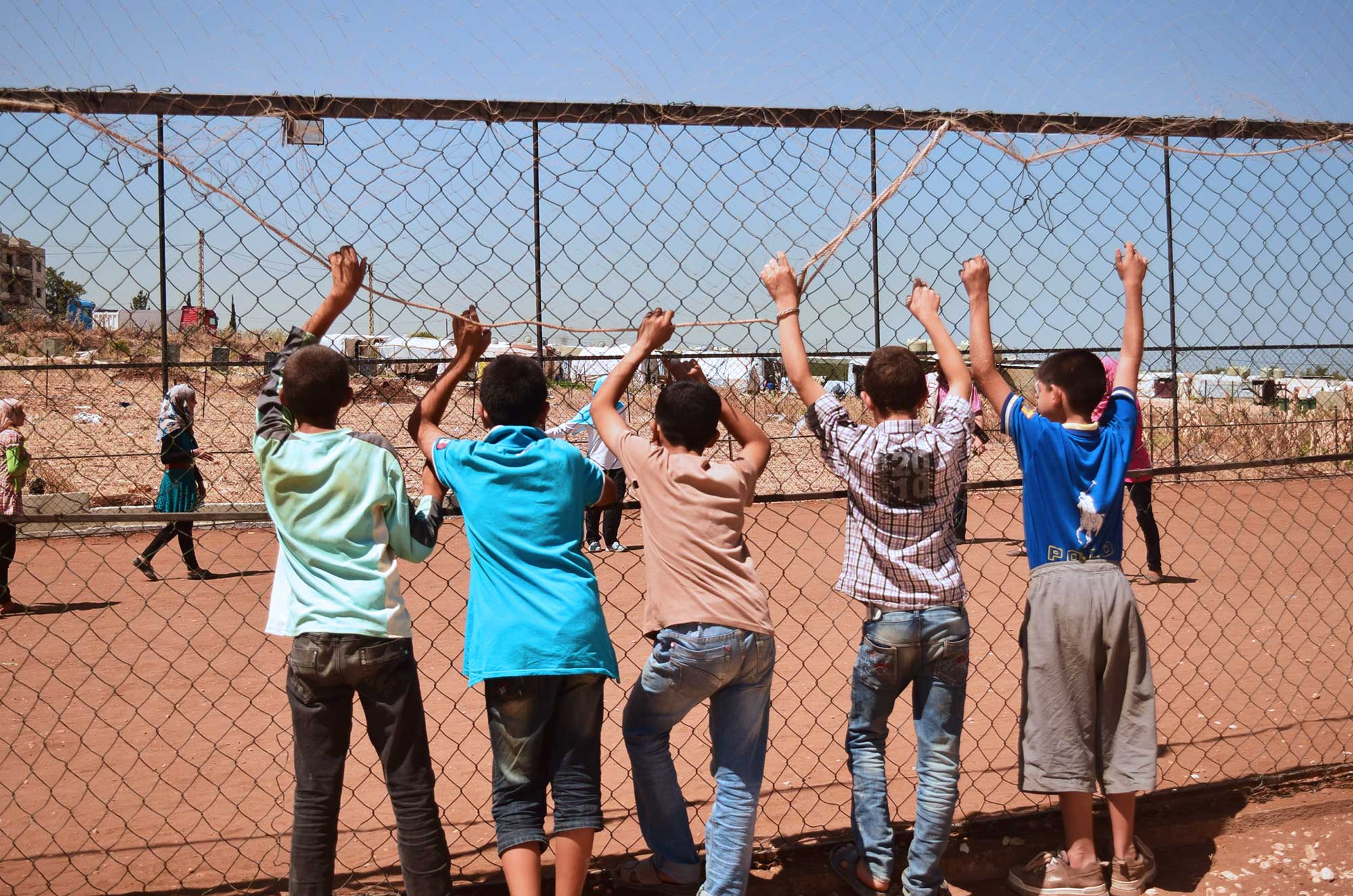 SYRIAN-REFUGEE-5 It’s a rare sight for the boys to be watching from the sidelines as the girls play.