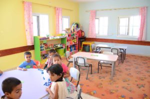 This classroom in Ramadeen was furnished and decorated with materials made by local artisans to meet Anera's high standards.