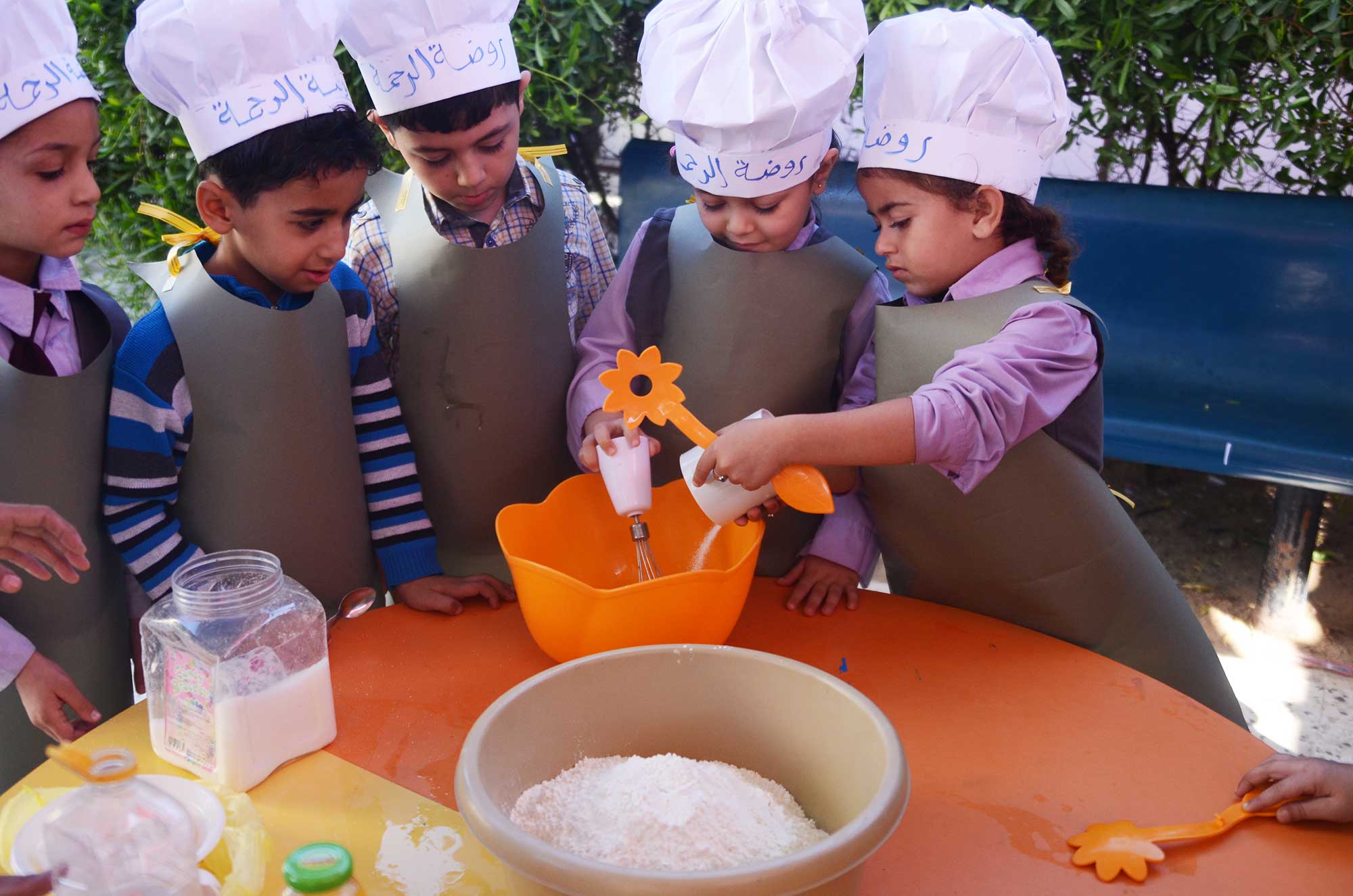 Children in Palestine learn with the help of their creative teachers.