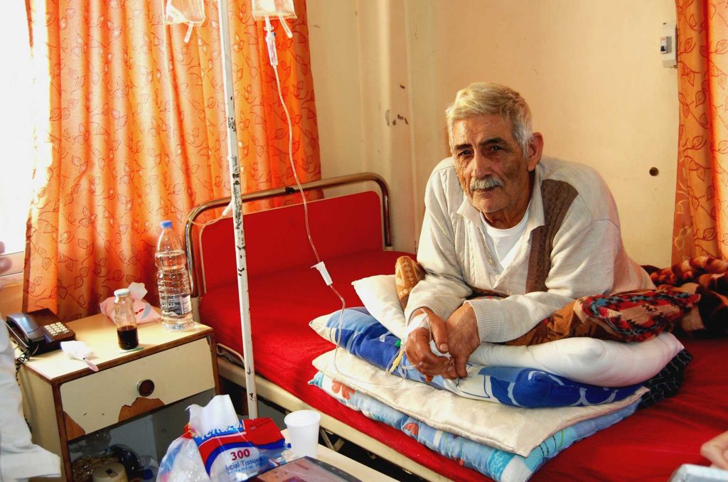 72-year-old Hussein was treated at Human Call for Chronic Obstructive Pulmonary Disease. His medicines and breathing tube were prodvided by Anera in 2011.