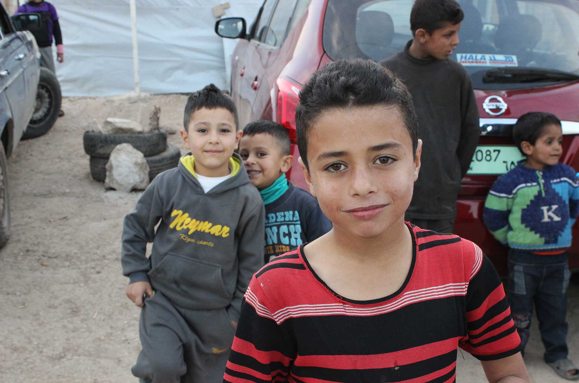 Some of the boys Niki met while visiting at a tent settlement in Bekaa Valley. The camp was in the process of being evacuated by authorities. ©Niki Erickson, November 2015