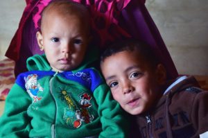 Mohammad and baby Aicha live in an informal tent settlement in Lebanon.