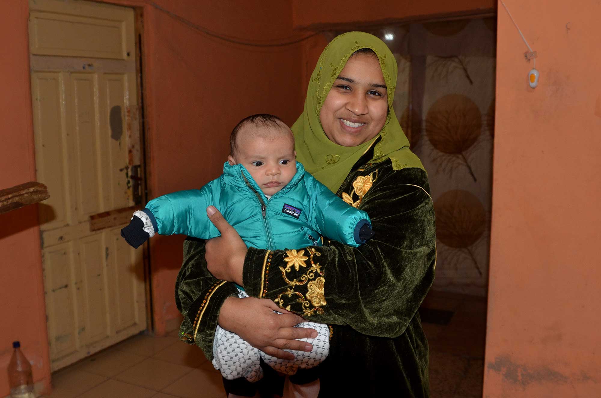 Gaza mothers like Asmaa need help to keep children warm this winter.