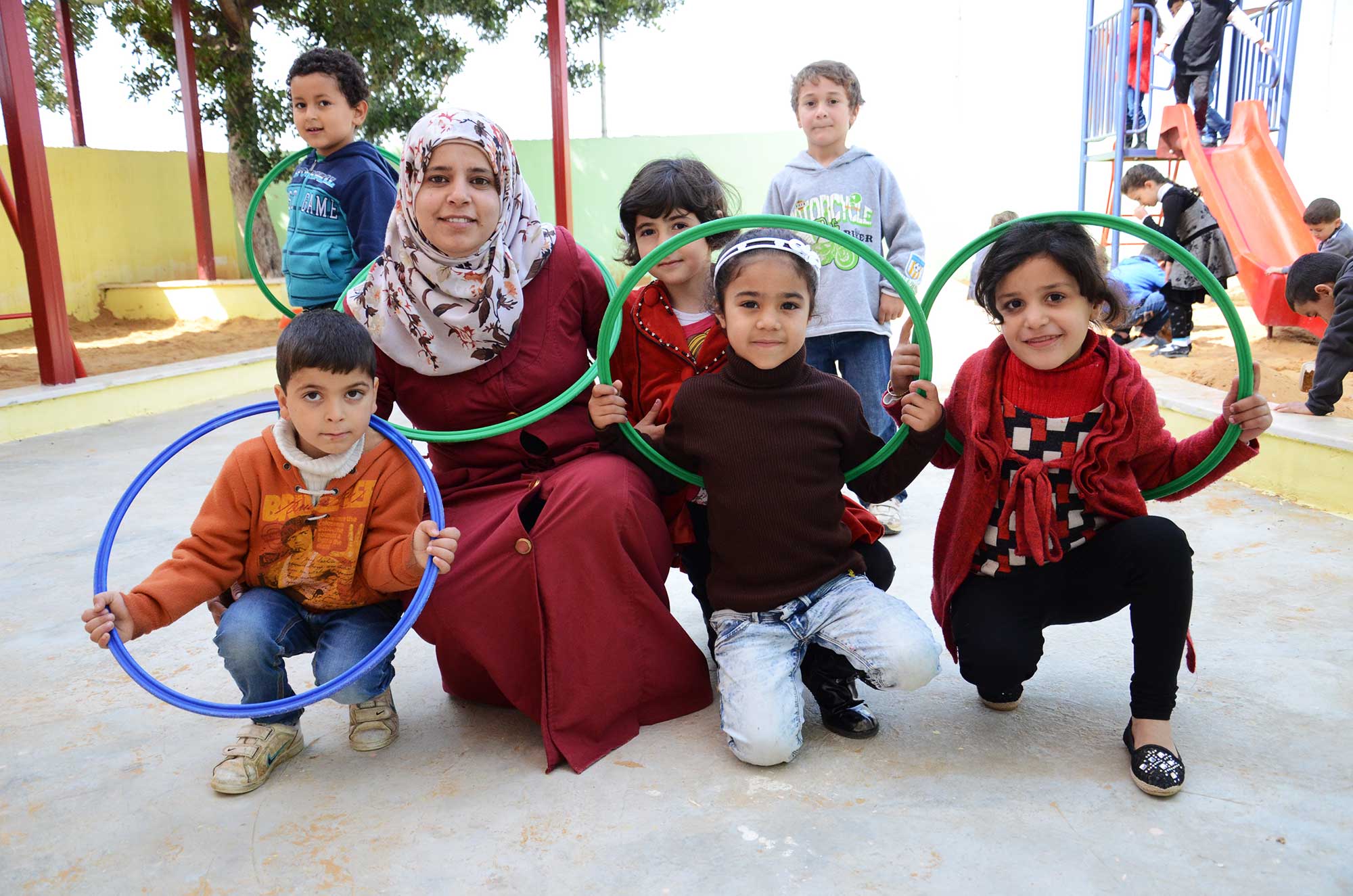 An Anera-trained teacher in Palestine engages her students with interactive learning and play.