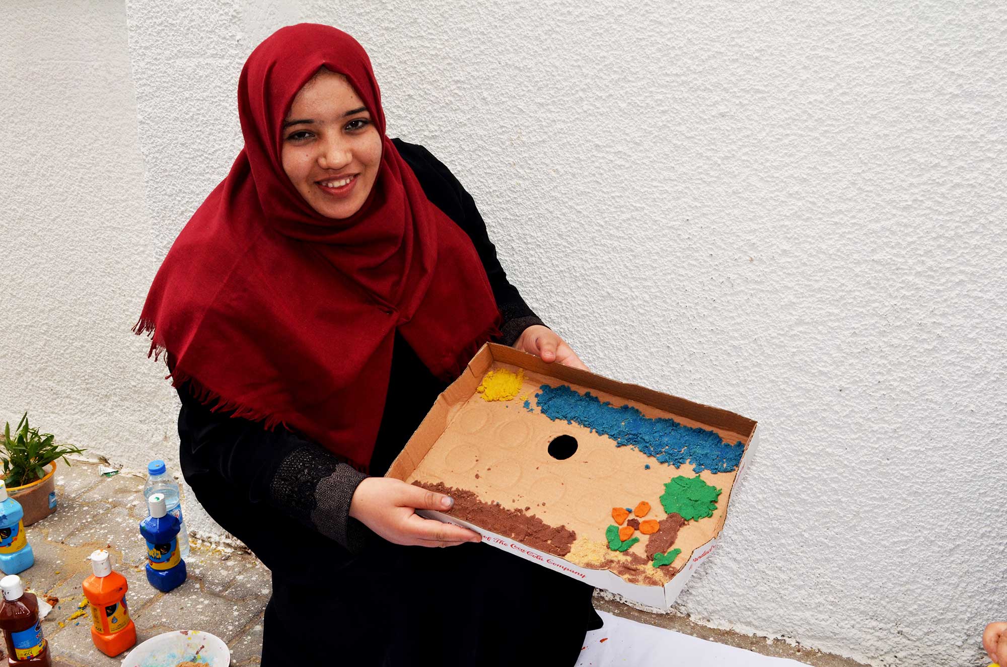 Teachers create fun dioramas using colorful clay.