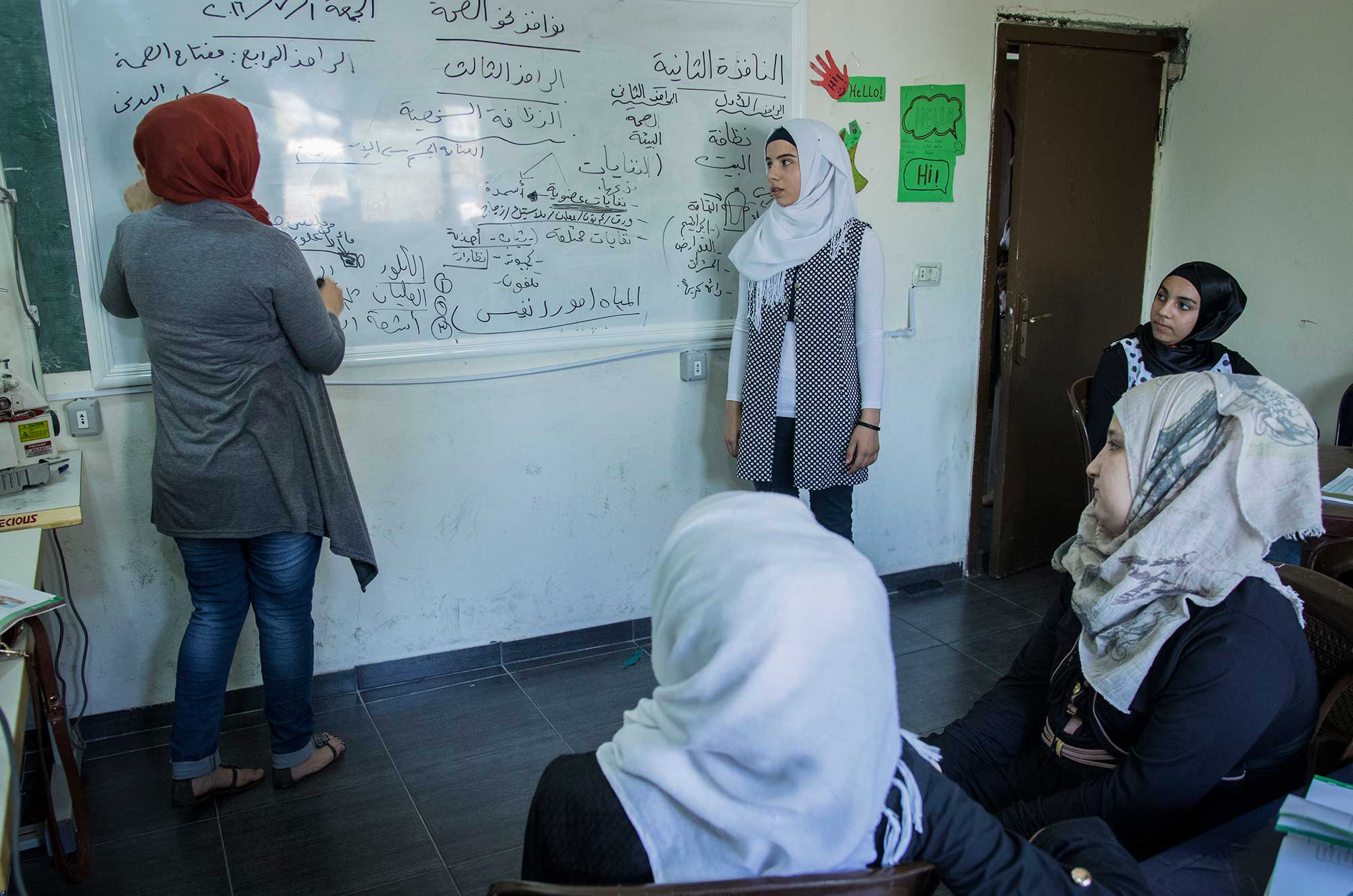 In this class, students are learning about personal health, the environment, water purification and waste sorting.