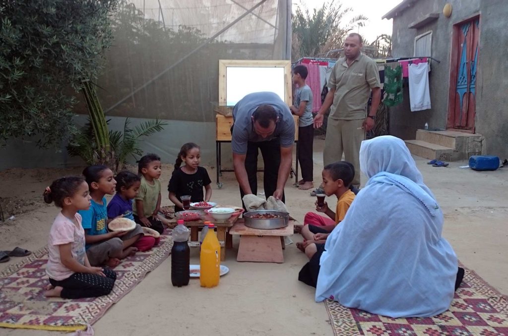 A family in Deir El Balah gathers around for iftar. "I was so excited when I saw the items in our food packages," says grandmother Fayza Abu Amera. "We rarely get the chance to eat cheese and meat. I can't express how grateful I feel this Ramadan."
