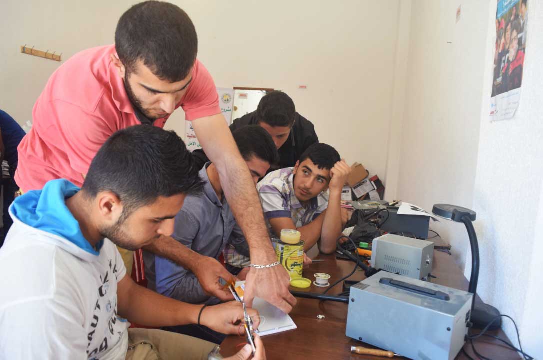 Mohammad Taleb, the phone repair instructor, says his students are eager to learn more.