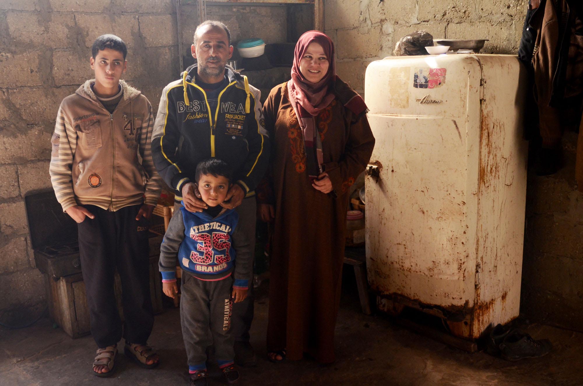gaza-farmer-shaban-in-home-with-family The Zoerob family in their home in Gaza.