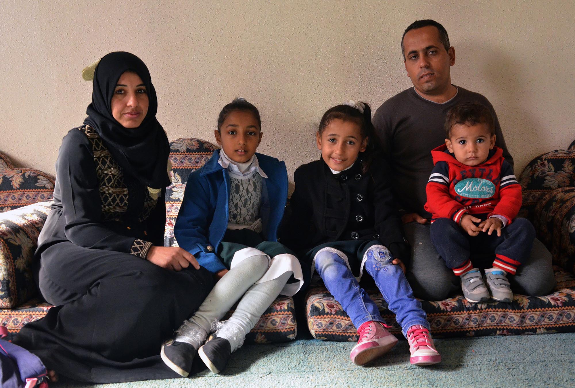 Family benefits from new Gaza sewage network.
