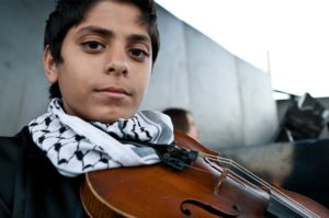 Teaching music in Palestine.