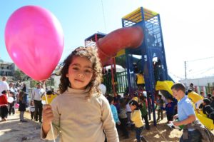Young Palestinian girl at a playground build by Anera in the West Bank, part of a playgrounds for Palestine initiative.