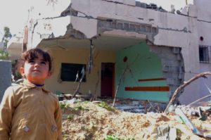 Preschooler in Gaza at her destroyed school, benefits from Anera's psychosocial work
