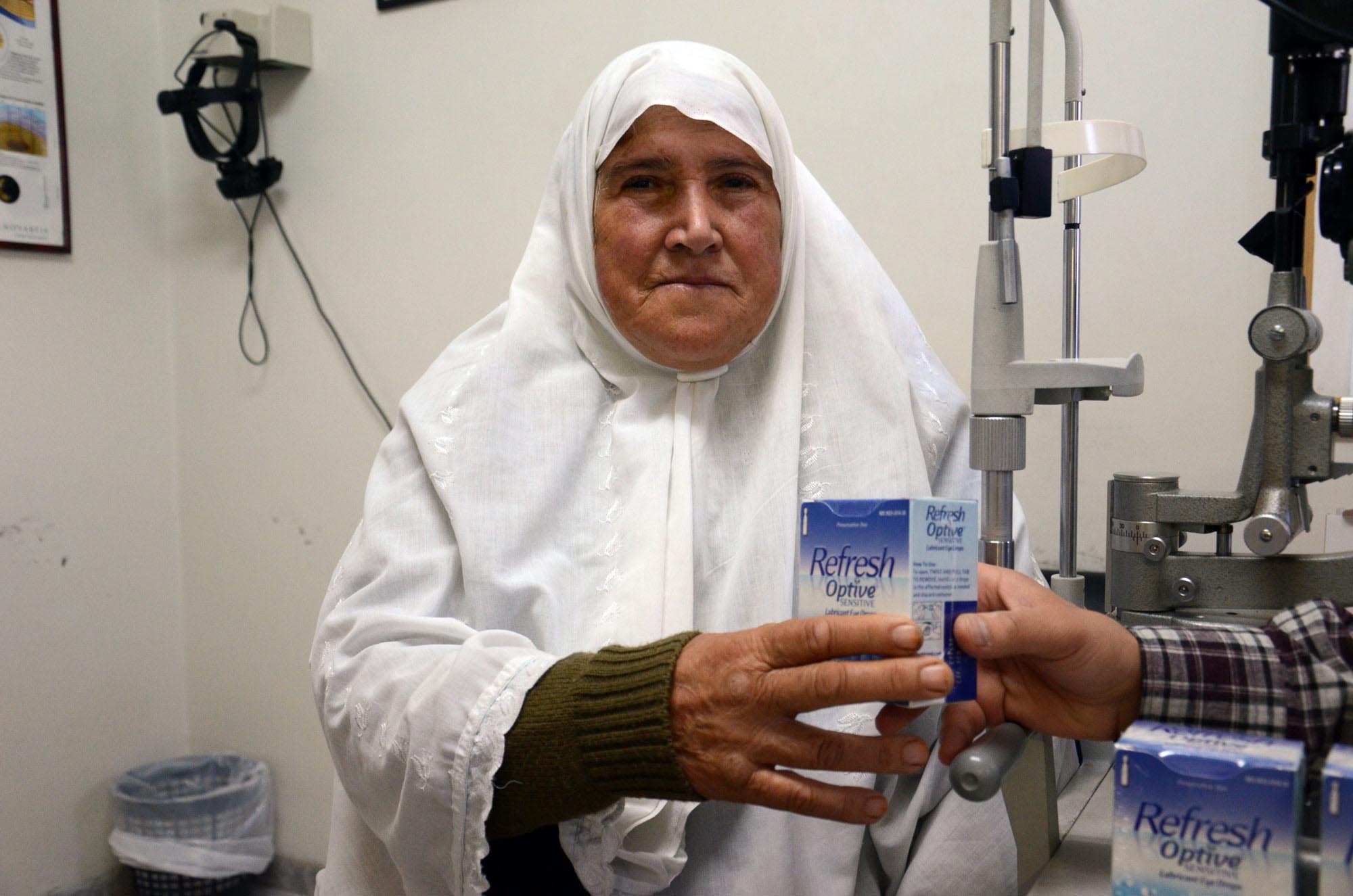 ClearerVisionPalestiniansHebron_1--WEB Amineh receives AmeriCares donated eye drops.
