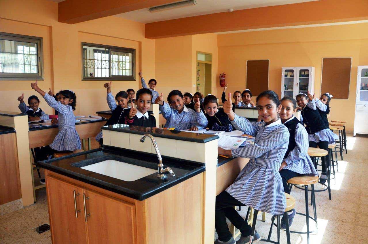 Almost 500 students get to use new facilities like science labs in West Bank schools.