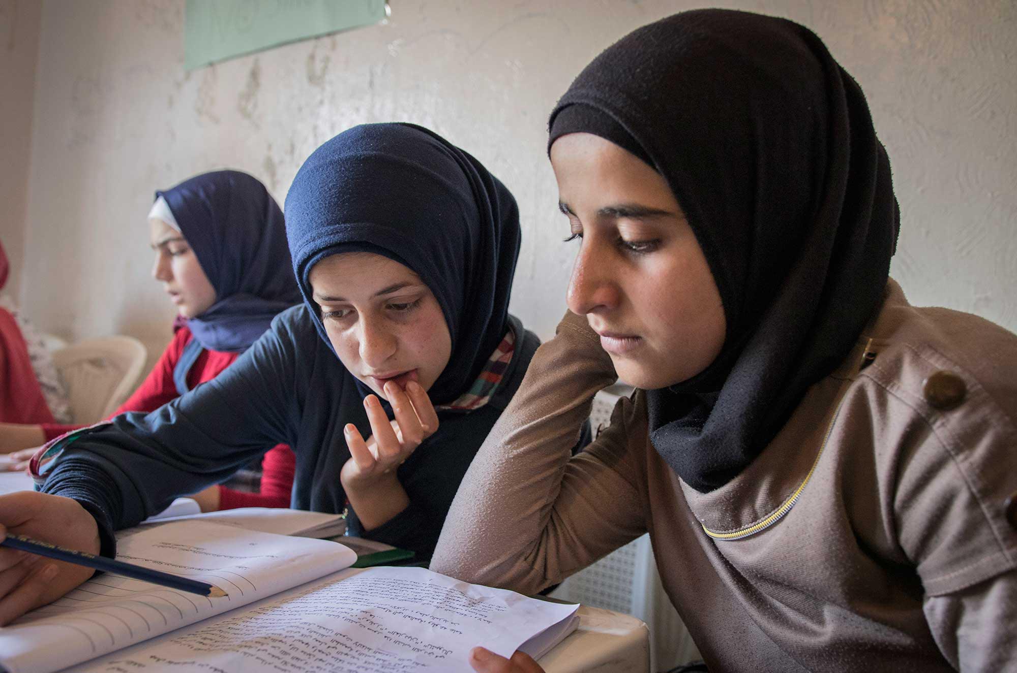 Mona attends literacy classes as part of Anera's program for refugee education in Lebanon.