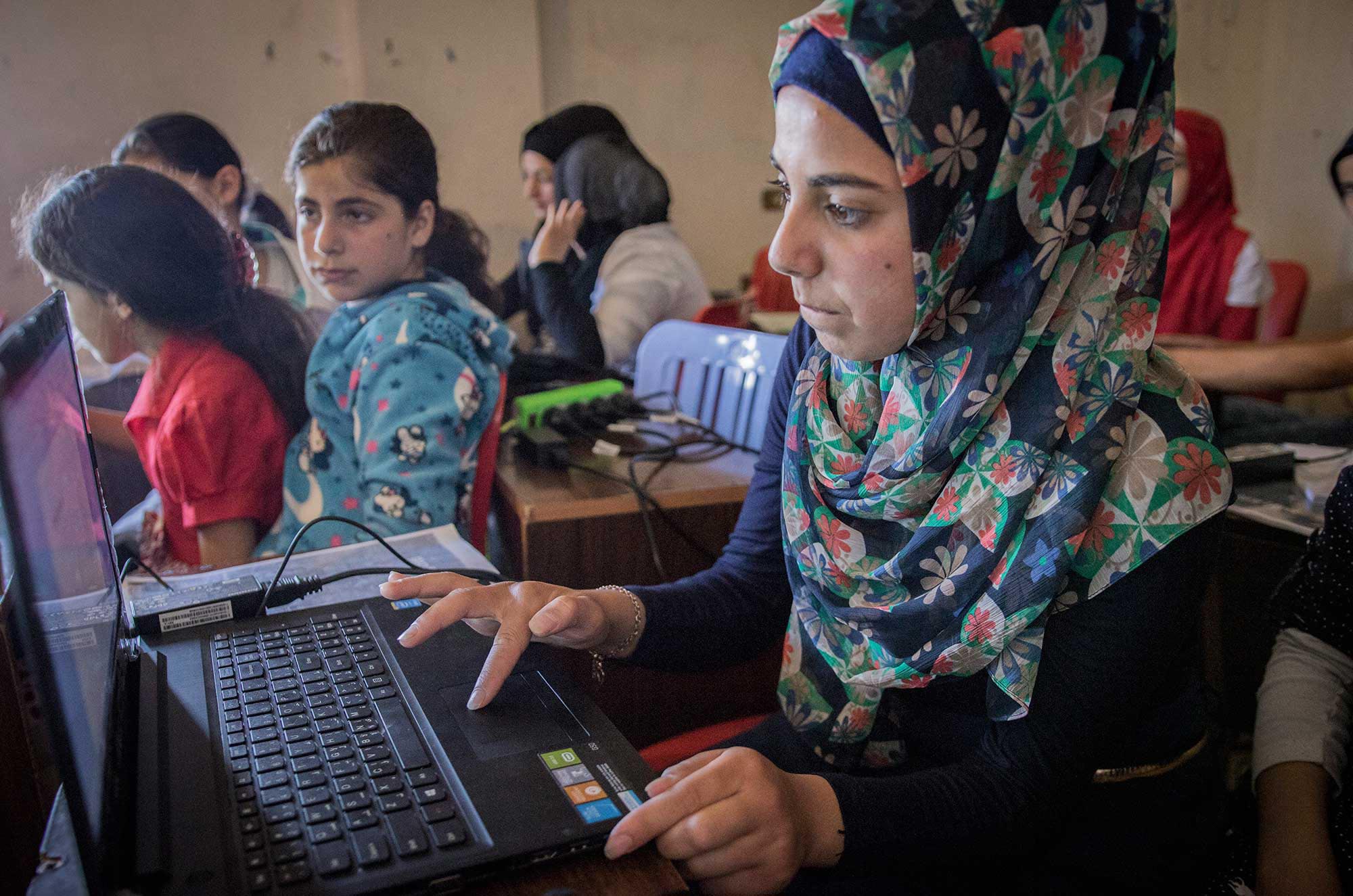 Refugee education in Lebanon includes computer courses for this Syrian girl