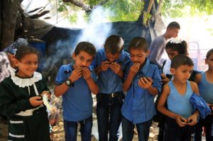 Gaza children eat sweet potato grown on family farms in Gaza.