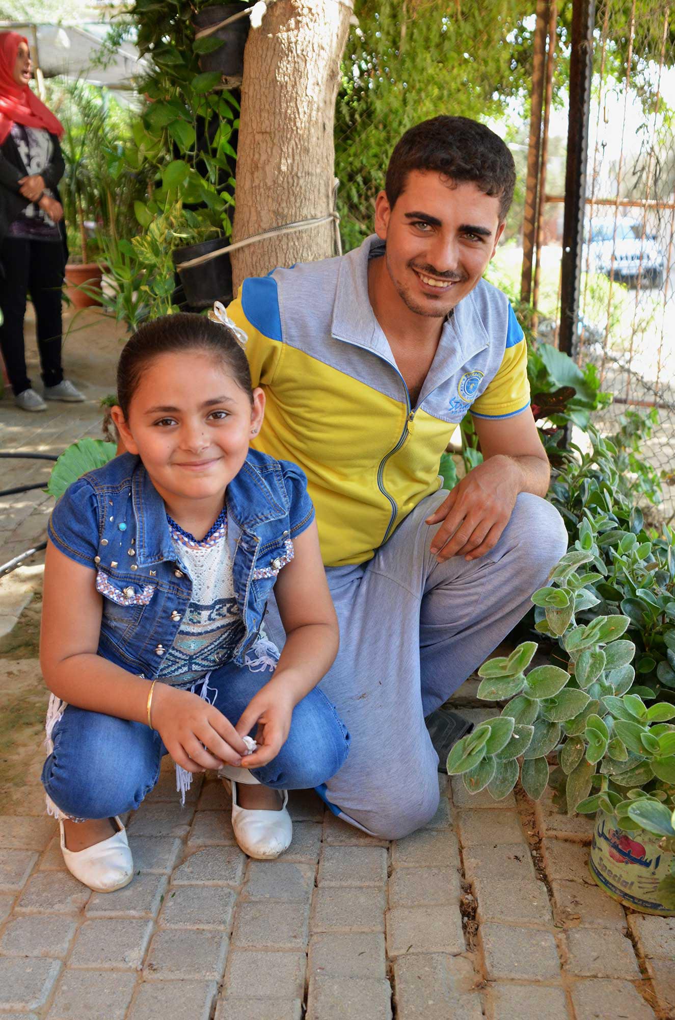 Saed loves to tend to his garden that grows with help from a water well.