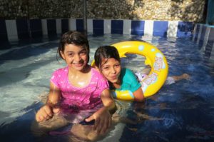 Palestinian refugee girls in Ein El Hilweh camp in Lebanon learn how to swim for the first time.