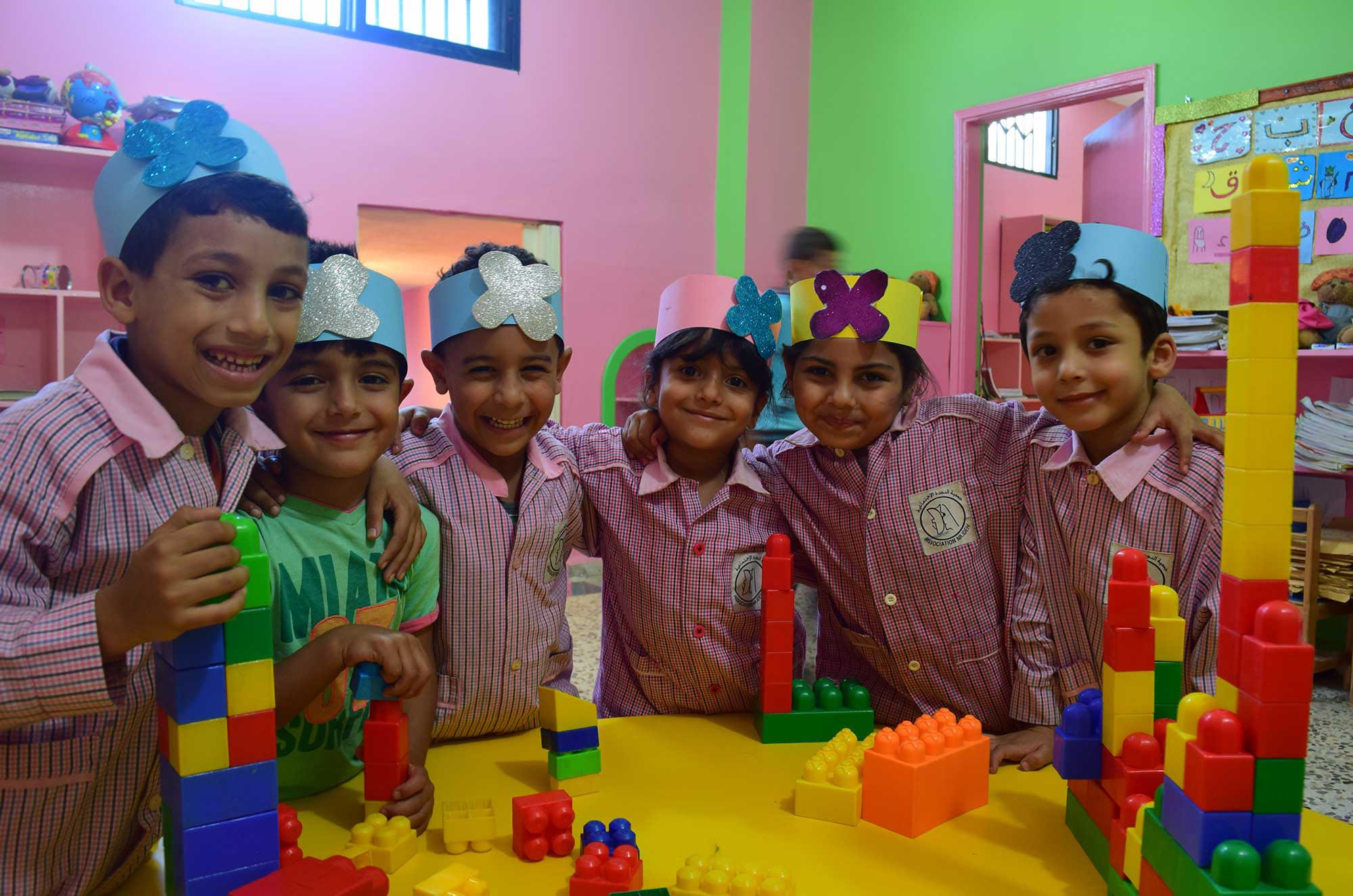Children in Burj El Shemali play in their new preschool classroom.