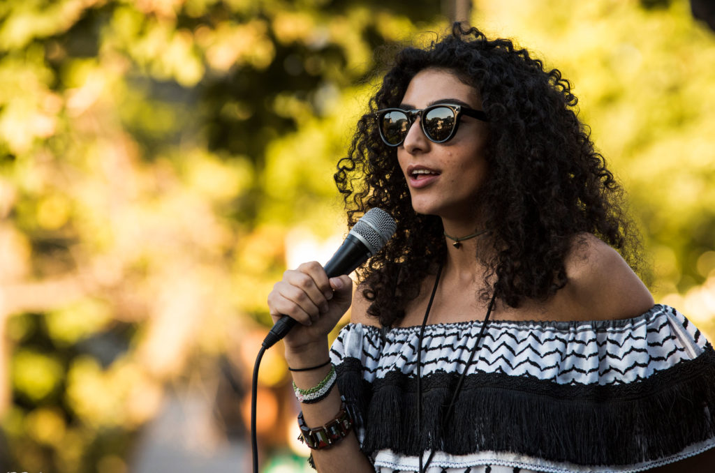 Karmel Sabri fundraising for Palestinian refugees at her Dear Gaza event.