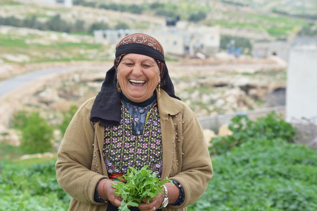 Hajja Sabhaglows with delight now that she can provide enough water for her family and farm.