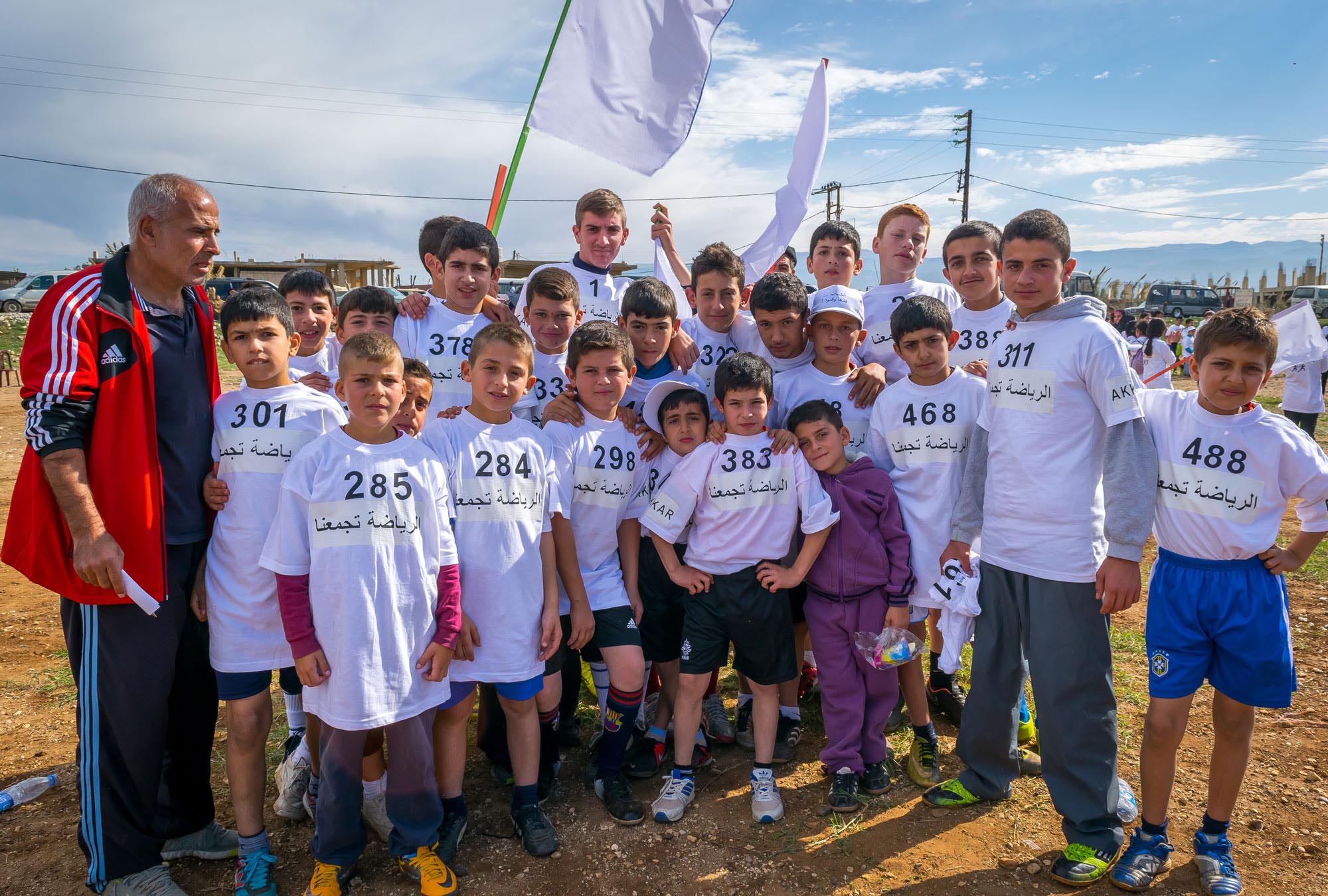 One of the 28 sporting clubs in front of the start line at Anera's mini-marathon in Akkar, northern Lebanon.
