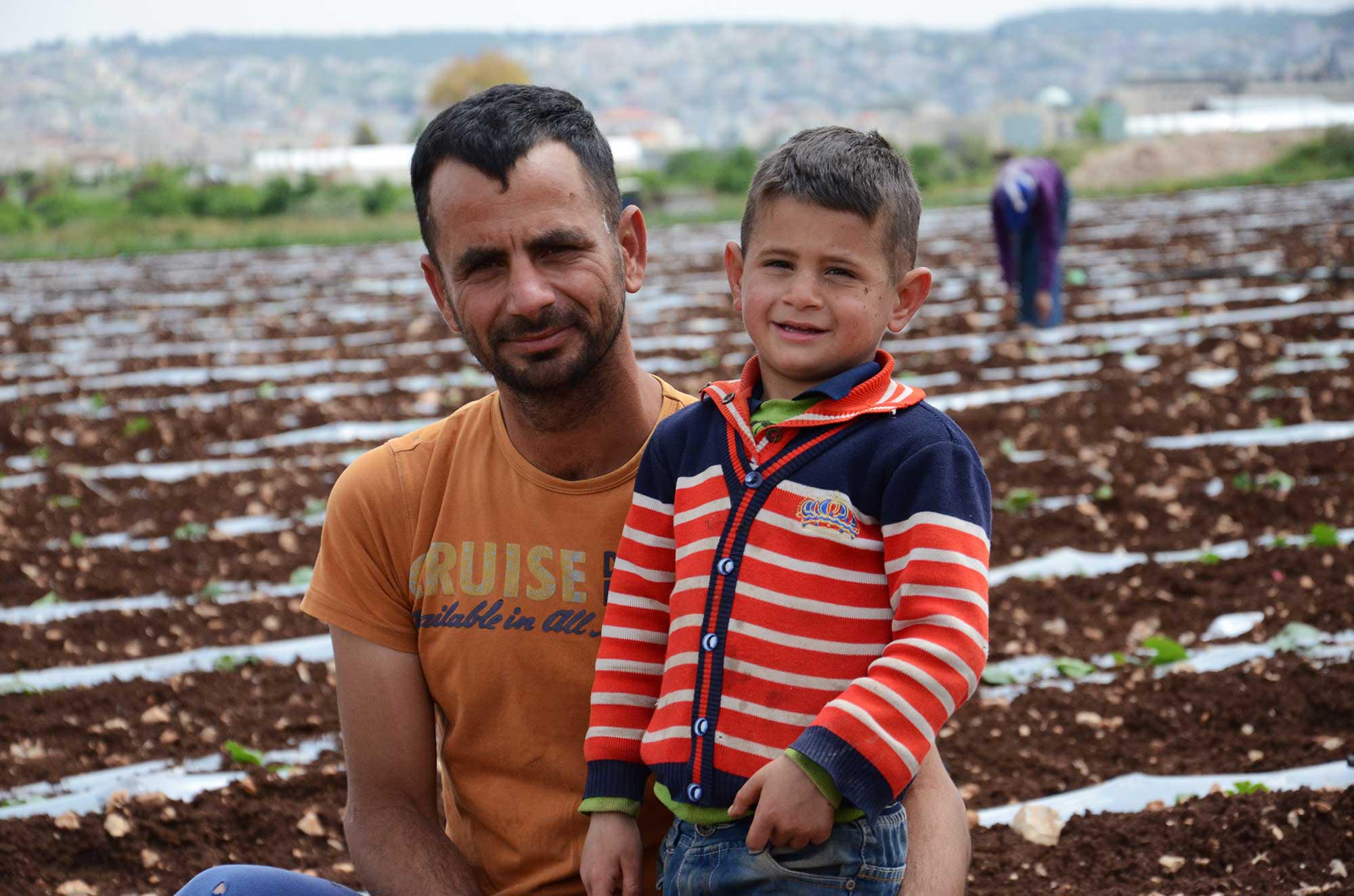 Mohammad is Imad’s worker on the farm. He’s pictured here with his son, Huthayfa.
