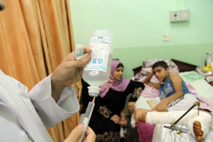 Gaza doctor uses the surgical antibiotic Anera delivered to his Gaza hospital.