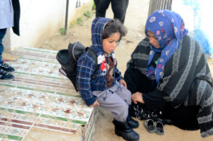 Gaza children like Ali rely on donations to keep warm this winter.