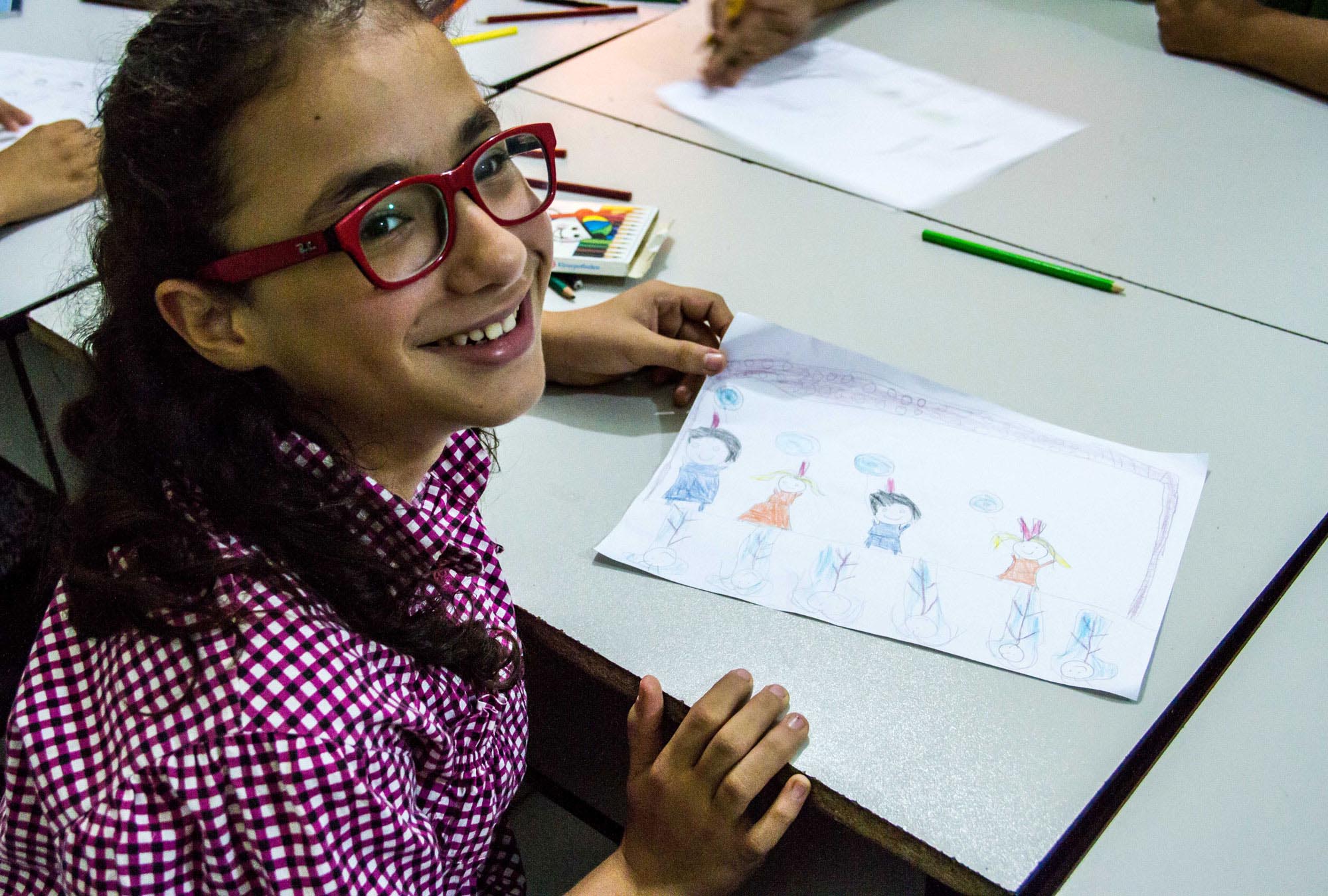 Dalal from the Shatila Palestinian refugee camp in Beirut draws pictures from her trip to the circus.