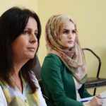 Manal (left) trains teachers to support Palestinian children with ADD/ADHD.