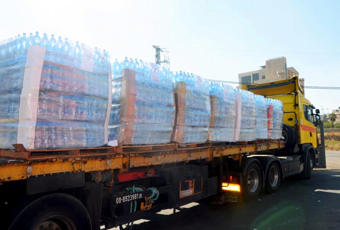 In Jerusalem, Anera loaded two trucks with enough water for more than 1,600 displaced families in Gaza.