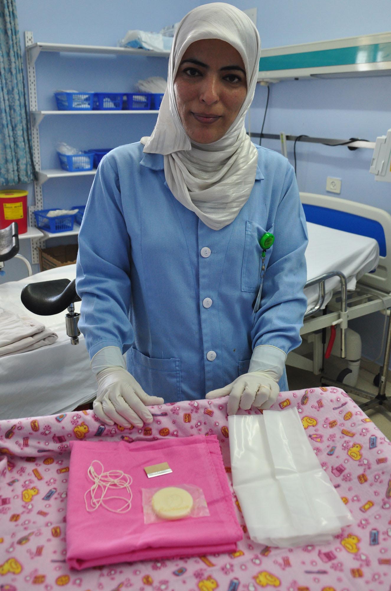 Nurse Na’ila is thankful for the new birthing kits, delivered to her West Bank hospital from Anera.