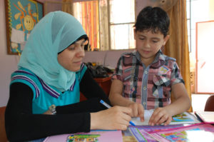 Mounir gets help to improve his reading and other skills in Anera's learning support program in Nahr El Bared refugee camp, Lebanon.