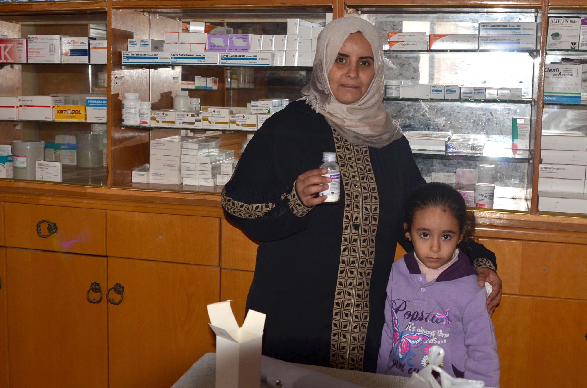 Madline and her daughter Lama came to the Gaza family clinic when Lama's fever worsened.