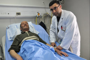 Palestinian heart patient awaiting treatment in West Bank hospital says new mattress is a comfort.